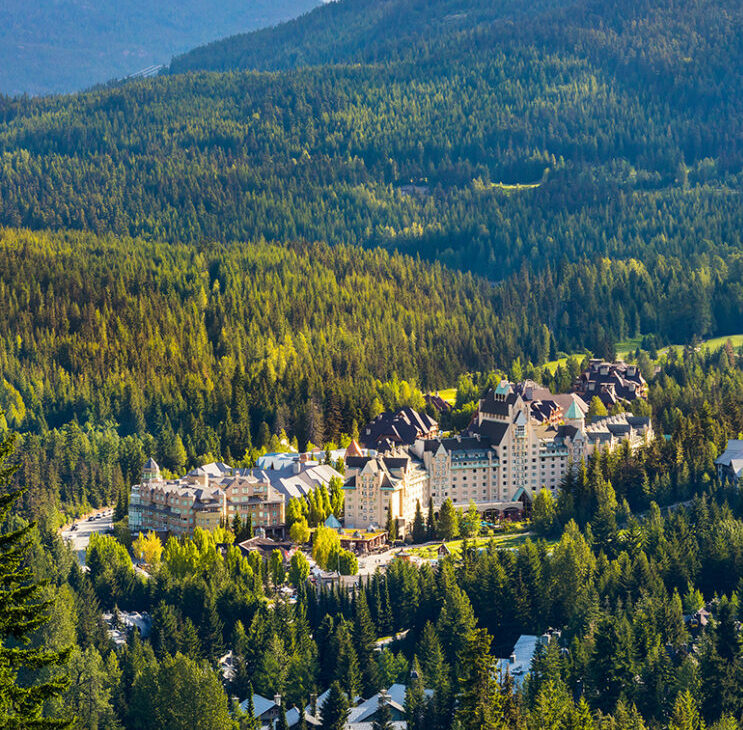 View from above of the Fairmont Chateau Whistler where it sits at the bottom of Blackcomb
