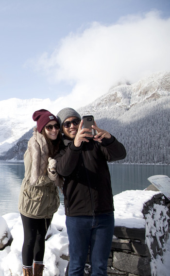 Couples winter trip at lake Louise.
