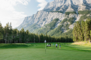 Golfers on the green at Fairmont Banff Springs Golf Course