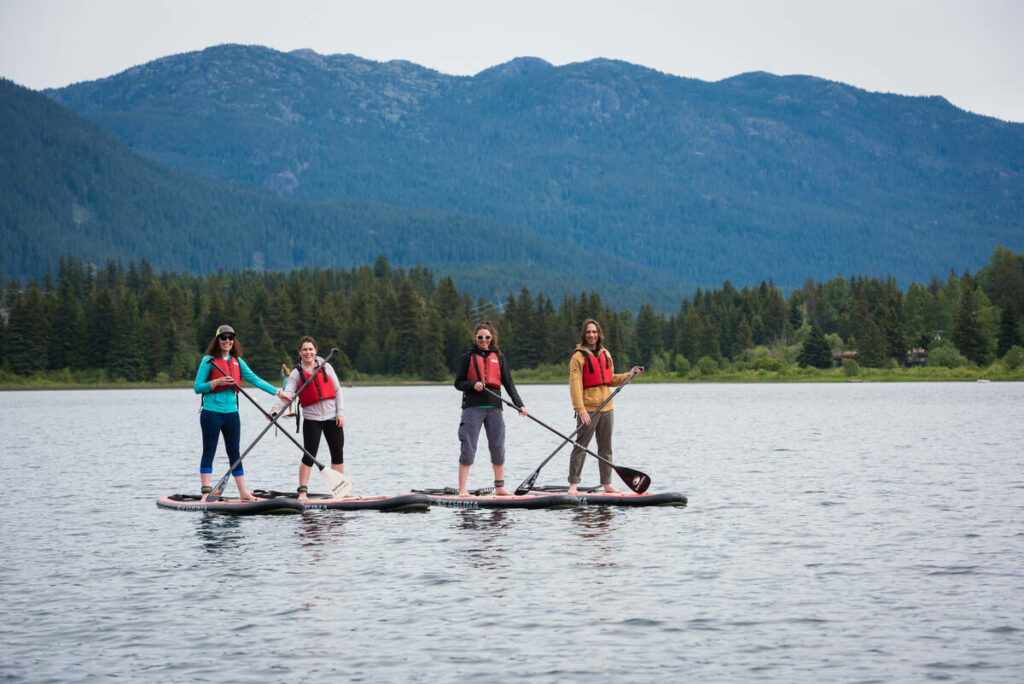 Traveling with your BFF - Paddleboarding in Whistler, CR Tourism Whistler/Mike Crane