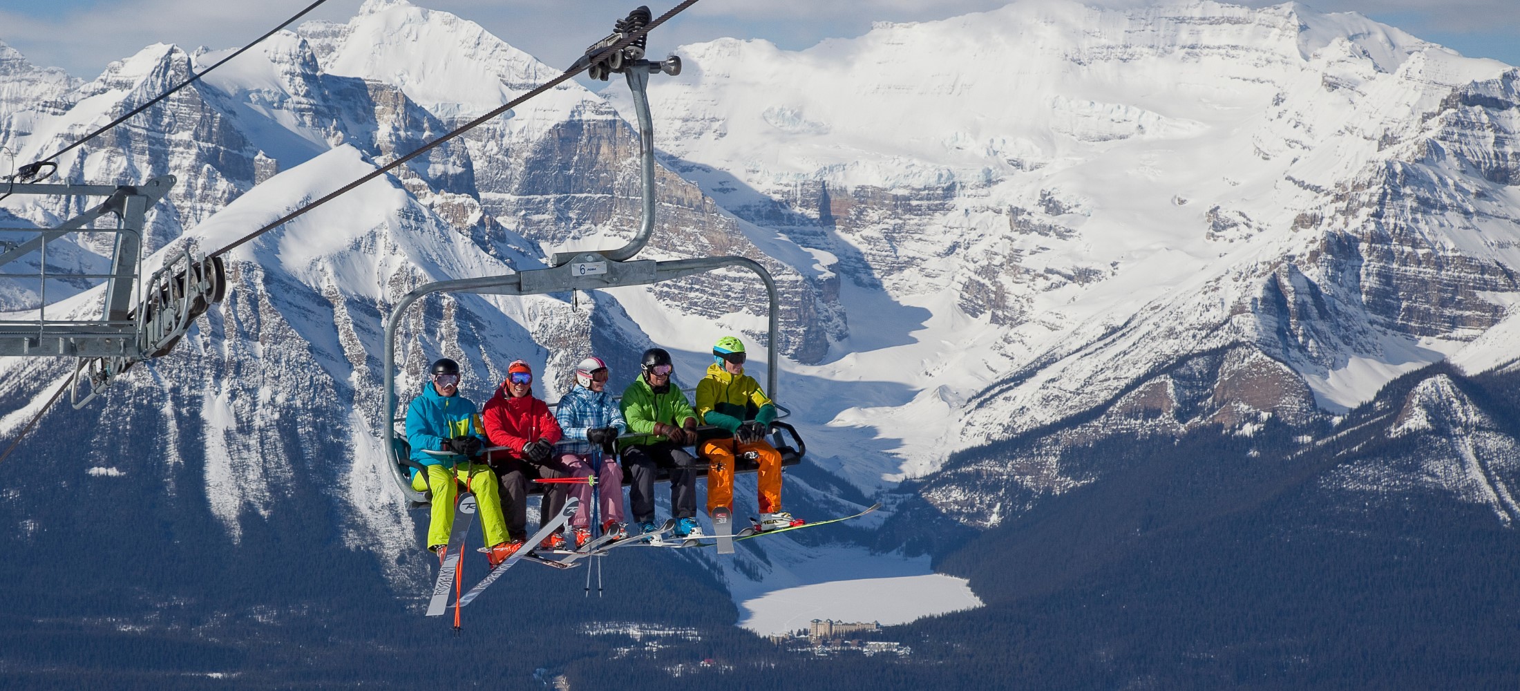 A group of friends on the chairlift at Lake Louise Ski Resort in Winter, Photo by Lake Louise Ski Resort & Chris Moseley