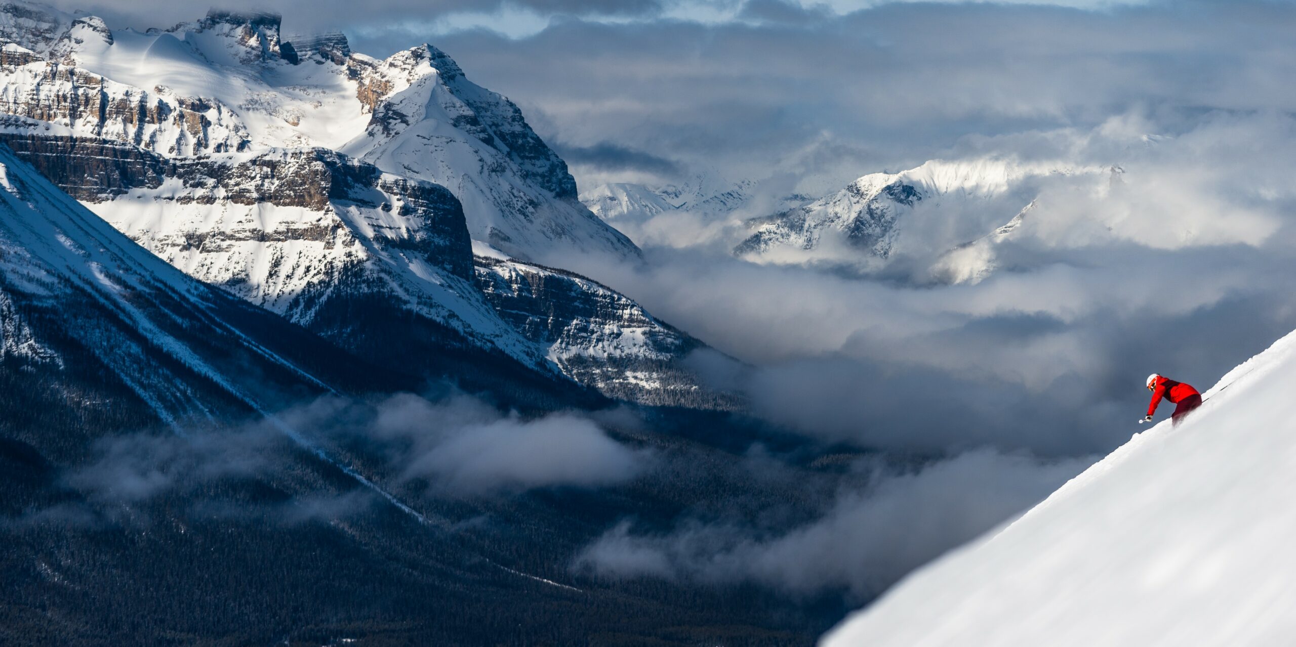 Skiing in Lake Louise Alberta with Mountain Collective Pass, photo by Reuben Krabbe / SkiBig3