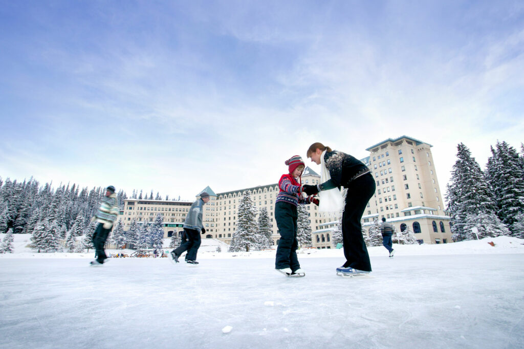 Family Ice Skating in Winter at Fairmont Chateau Lake Louise